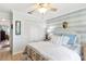 Light and airy bedroom with white closet doors and a tranquil feel at 6147 Spinnaker Loop, Lady Lake, FL 32159