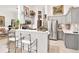 Updated kitchen featuring stainless steel appliances and gray cabinets at 6147 Spinnaker Loop, Lady Lake, FL 32159