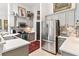 Well-equipped kitchen with stainless steel appliances and gray cabinets at 6147 Spinnaker Loop, Lady Lake, FL 32159