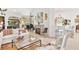 Bright living room with comfortable seating and open kitchen view at 6147 Spinnaker Loop, Lady Lake, FL 32159