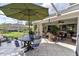 Expansive screened patio, great for outdoor dining and relaxation at 6147 Spinnaker Loop, Lady Lake, FL 32159