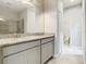 Bathroom boasts granite countertops and a walk-in shower at 8512 Magnificent Ln, Groveland, FL 34736