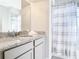 Bathroom with granite countertop and shower/tub combo at 8512 Magnificent Ln, Groveland, FL 34736