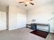 Bedroom with double doors closet and ceiling fan at 8512 Magnificent Ln, Groveland, FL 34736