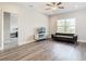 Large bonus room with wood-look floors and ample natural light at 8512 Magnificent Ln, Groveland, FL 34736
