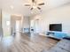 Spacious bonus room with wood-look floors and multiple access points at 8512 Magnificent Ln, Groveland, FL 34736
