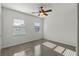 Bright bedroom with ceiling fan and wood flooring at 9084 Shepton St, Orlando, FL 32825