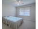 Bedroom with ceiling fan and window coverings at 941 Eastmont Ct, The Villages, FL 32162