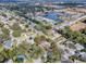 Aerial view of a single-Gathering home and its surroundings in a residential neighborhood at 1001 Amarillo Pl, The Villages, FL 32159