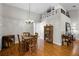 Formal dining room with hardwood floors and antique furniture at 1126 Breezy Knoll St, Minneola, FL 34715