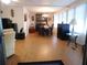 Spacious dining area with wood table and hutch at 117 Hibiscus Way, Leesburg, FL 34748