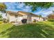 Spacious backyard with patio and lawn at 1233 Carvello Dr, The Villages, FL 32162