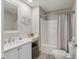 Full bathroom, white cabinets, shower/tub combo at 1233 Carvello Dr, The Villages, FL 32162