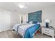 Bright bedroom with double bed and ample closet space at 1233 Carvello Dr, The Villages, FL 32162