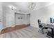 Home office with wood floors and neutral color palette at 1239 Alapaha Ln, Orlando, FL 32828