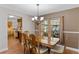 Formal dining room with a large wooden table and six chairs at 1255 Cardinal Ct, Altamonte Springs, FL 32714