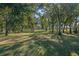 Peaceful park-like setting with mature trees and grassy areas at 1255 Cardinal Ct, Altamonte Springs, FL 32714