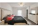 Bright bedroom featuring a comfortable bed and ample closet space at 1270 Stratton Ave, Groveland, FL 34736