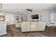 Spacious living room with a ceiling fan and comfortable seating at 1270 Stratton Ave, Groveland, FL 34736
