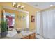 Clean bathroom with single sink vanity and shower at 151 Rubino Dr, Davenport, FL 33837