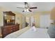 King size bed, dresser, and ensuite bathroom at 151 Rubino Dr, Davenport, FL 33837