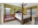 Bedroom with king-size bed and crib at 151 Rubino Dr, Davenport, FL 33837