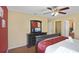 Bedroom with a queen-size bed and en-suite bathroom at 151 Rubino Dr, Davenport, FL 33837