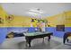 Game room with pool table, air hockey, and board games at 151 Rubino Dr, Davenport, FL 33837