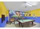 Game room featuring a pool table, foosball, and mural at 151 Rubino Dr, Davenport, FL 33837