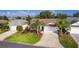 Aerial view of a house with palm trees at 2131 Callaway Dr, The Villages, FL 32162