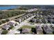 Aerial view of a residential neighborhood with houses and landscaping at 2703 Limerick Cir, Grand Island, FL 32735