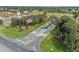 Grand entrance to community with fountain and flag at 27214 Stoney Brook Dr, Leesburg, FL 34748