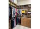 Organized walk-in closet with ample shelving and hanging space at 2850 Apache Ct, The Villages, FL 32163