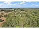 Wide aerial view of property and neighborhood at 34620 Galla Rd, Fruitland Park, FL 34731