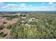 Wide aerial view of property and surrounding area at 34620 Galla Rd, Fruitland Park, FL 34731