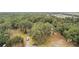 Aerial view of property with driveway and shed at 34620 Galla Rd, Fruitland Park, FL 34731