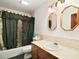 Bathroom with shower/tub and wood vanity at 34620 Galla Rd, Fruitland Park, FL 34731