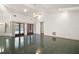 Bright living room with high ceilings and dark tile floors at 34620 Galla Rd, Fruitland Park, FL 34731