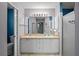 Bathroom boasts double sinks and a shower at 3550 Auburndale Ave, The Villages, FL 32162