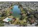 Aerial view of community amenities, including a pool, bocce, and shuffleboard at 3550 Auburndale Ave, The Villages, FL 32162