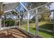 Peaceful screened porch overlooking backyard at 3550 Auburndale Ave, The Villages, FL 32162