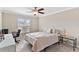 Bedroom with a desk and a ceiling fan at 39320 Harbor Hills Blvd, Lady Lake, FL 32159