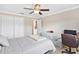 Bedroom with a ceiling fan and double closet at 39320 Harbor Hills Blvd, Lady Lake, FL 32159