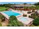 Community pool and clubhouse with plenty of space for lounging and recreation at 39320 Harbor Hills Blvd, Lady Lake, FL 32159