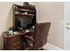 Convenient home office features built-in shelving and a comfortable leather chair at 39320 Harbor Hills Blvd, Lady Lake, FL 32159
