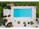 Large community pool with lap lanes, hot tub, and ample lounge chairs at 39320 Harbor Hills Blvd, Lady Lake, FL 32159