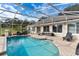 Enjoy this beautiful screened pool area at 39320 Harbor Hills Blvd, Lady Lake, FL 32159