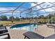 Relaxing screened pool and patio area at 39320 Harbor Hills Blvd, Lady Lake, FL 32159