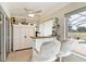 Small bar in a sunroom, perfect for entertaining at 39320 Harbor Hills Blvd, Lady Lake, FL 32159