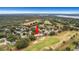 Bird's-eye view showcasing the home's golf course location in the community at 5509 Grove Mnr, Lady Lake, FL 32159